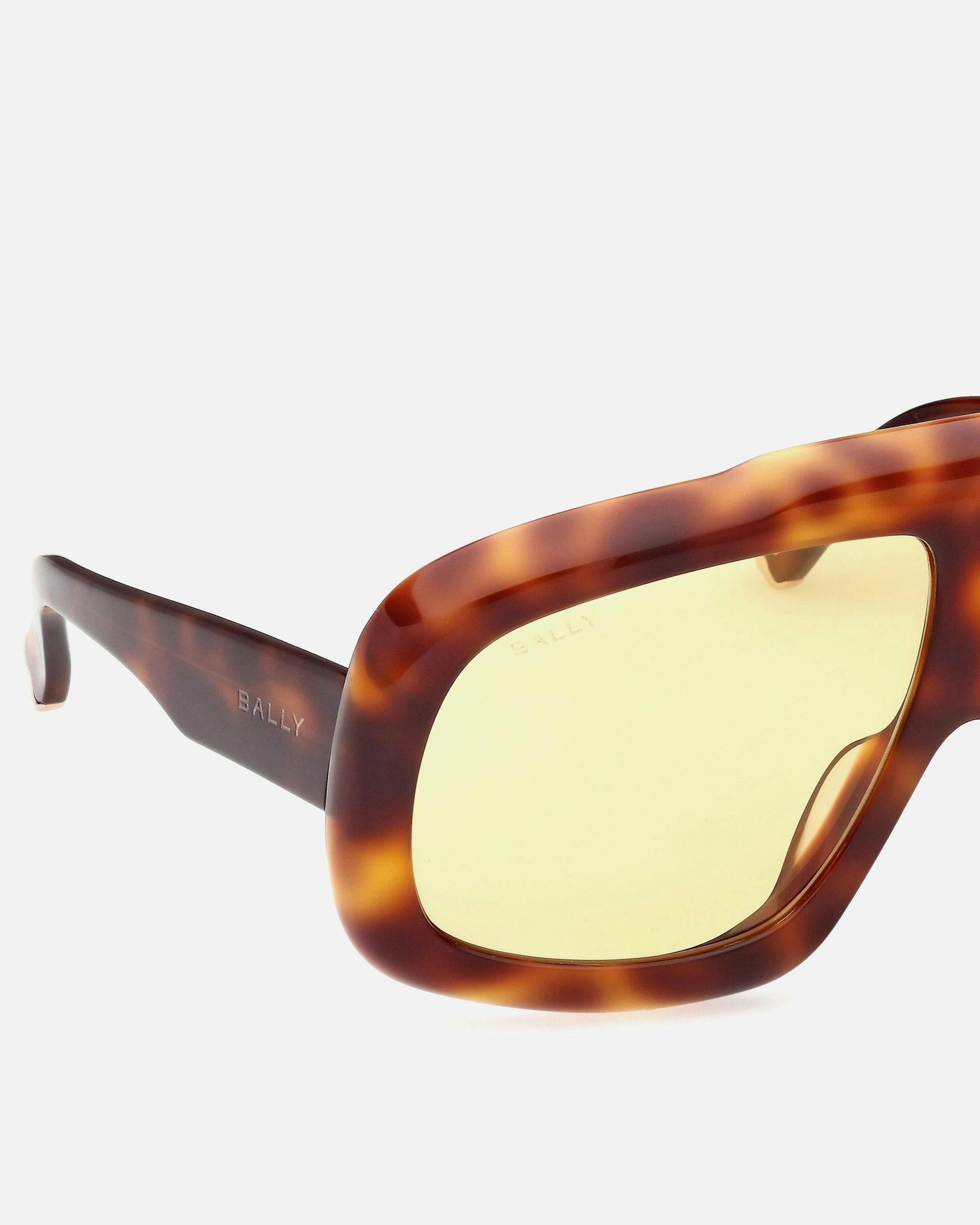 Eyger Acetate Sunglasses in Havana and Yellow | Bally | Still Life Detail
