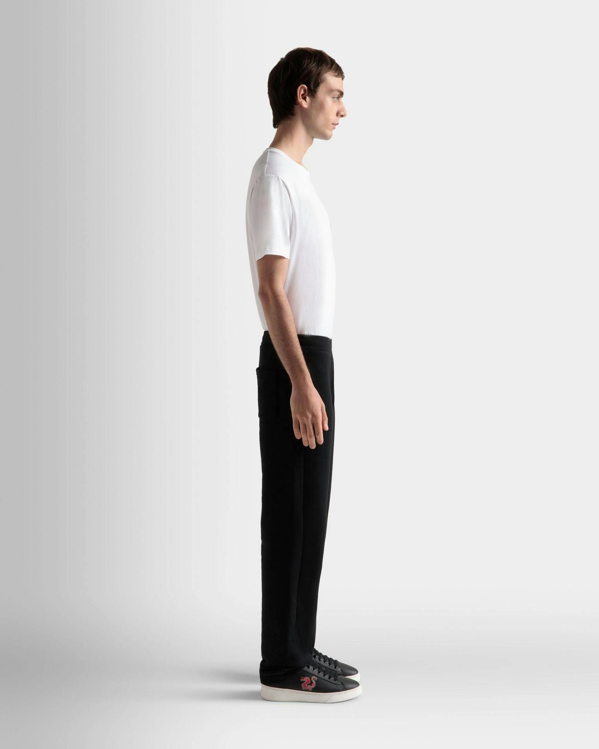 Men's Sweatpants In A Black Cotton Blend | Bally | On Model 3/4 Front