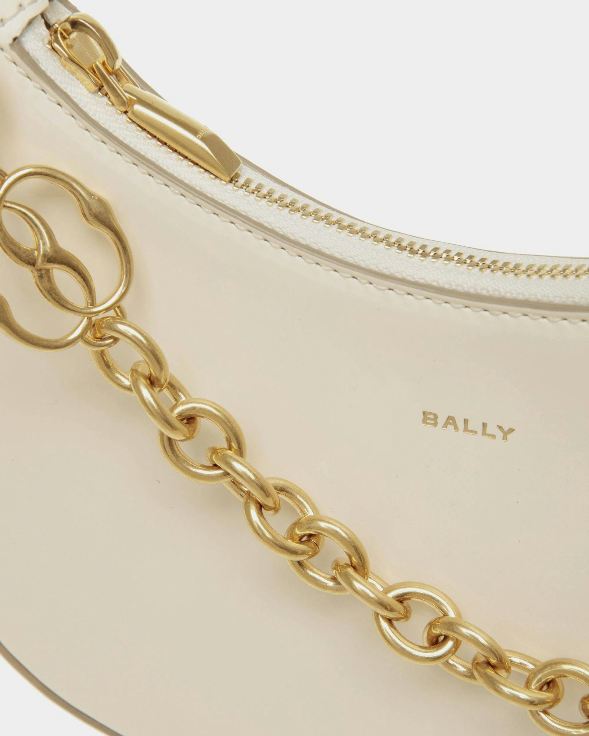 Women's Emblem Mini Crossbody Bag In White Patent Leather | Bally | Still Life Detail