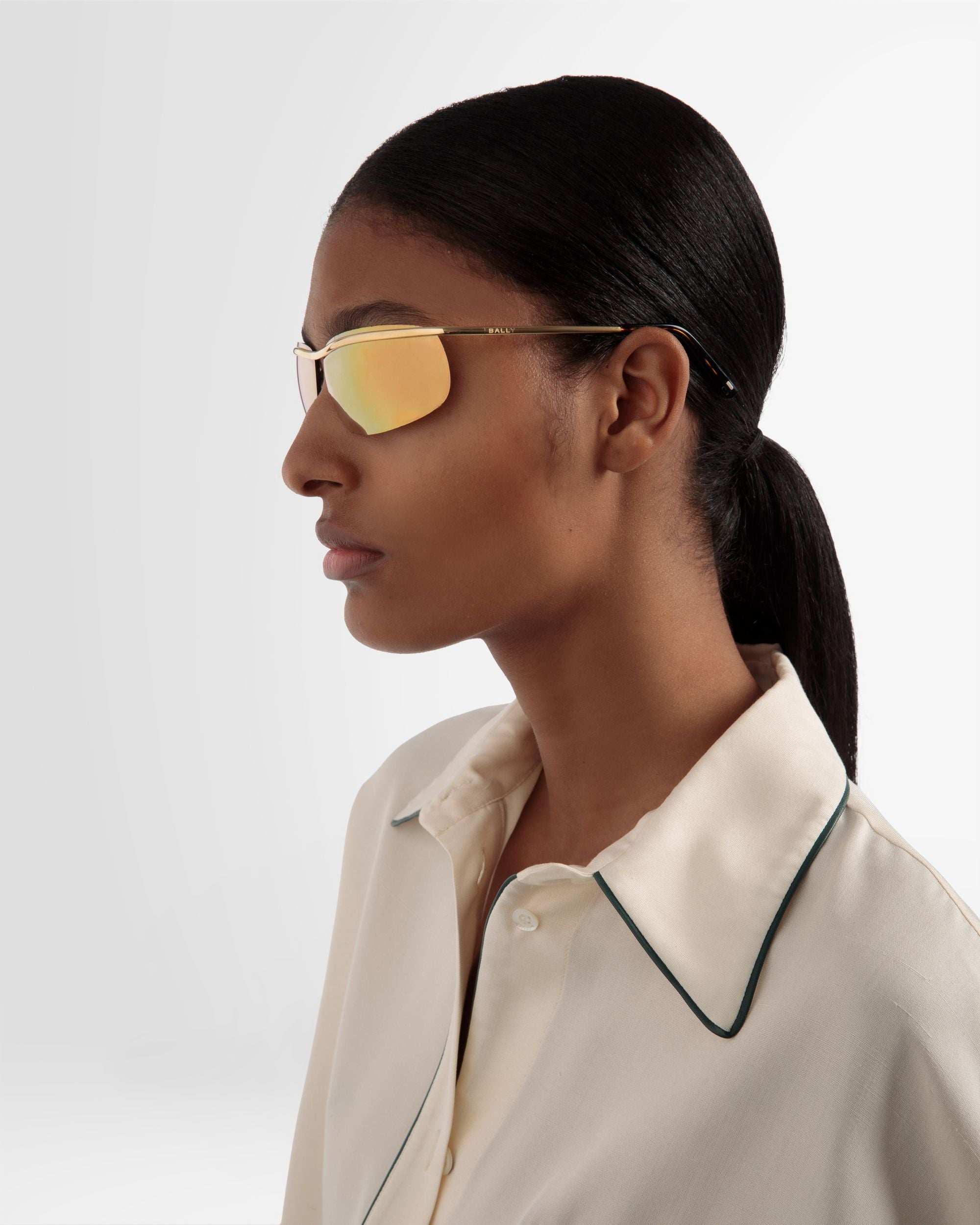 Bally Global - リムレスシャークサングラス シャイニーゴールドメタル＆ミラーゴールド - ゴールド