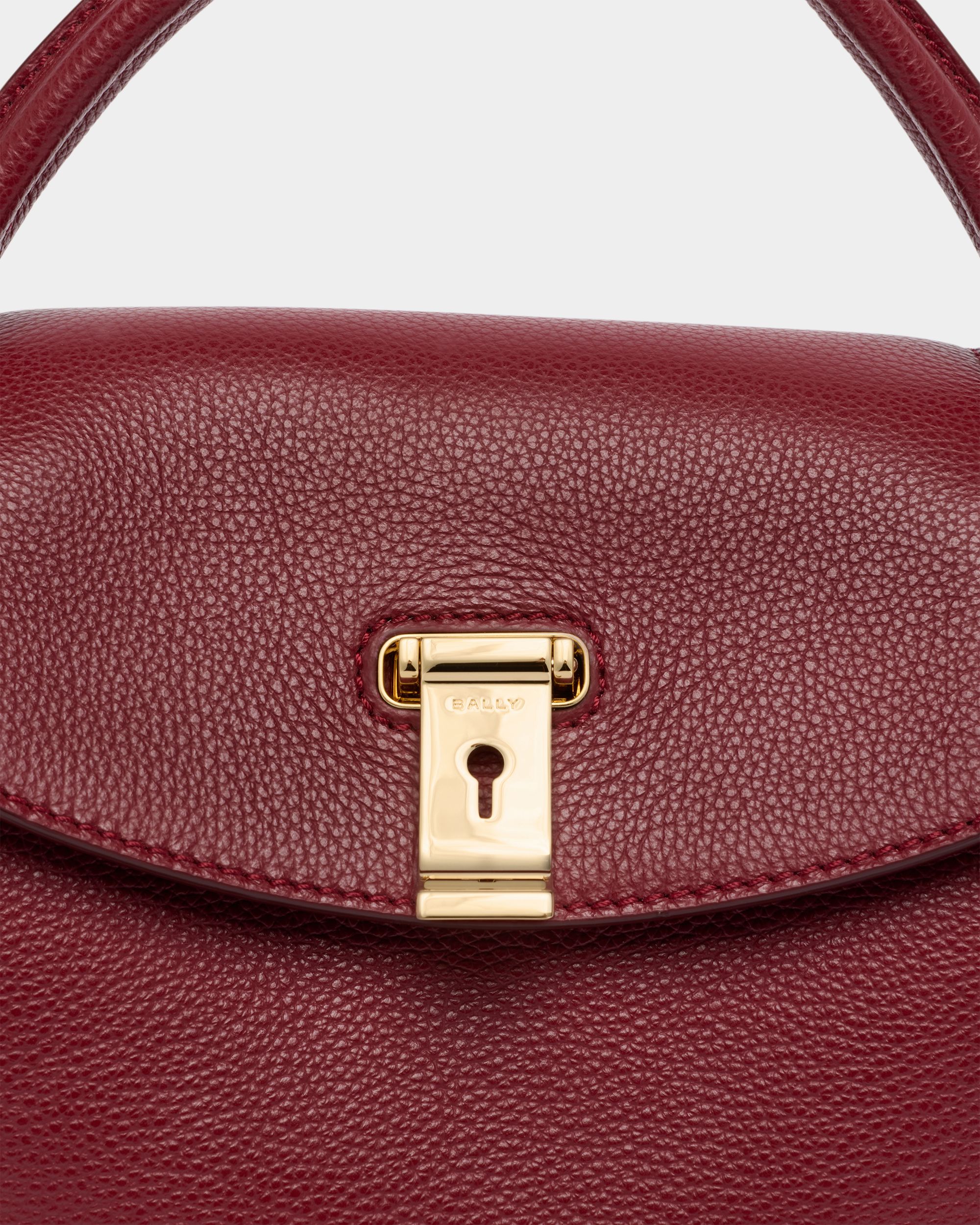 Bally Global - Lock Me Small Top Handle Bag in Ruby Red Grained Leather - Red